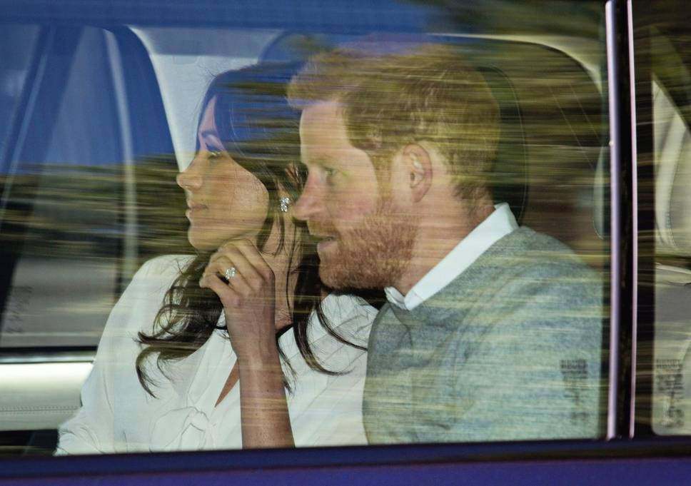 Meghan and harry in car